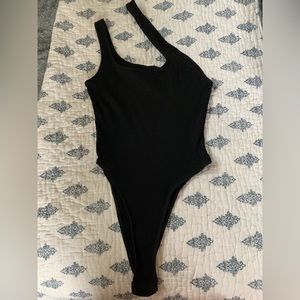 Asymmetrical body suit